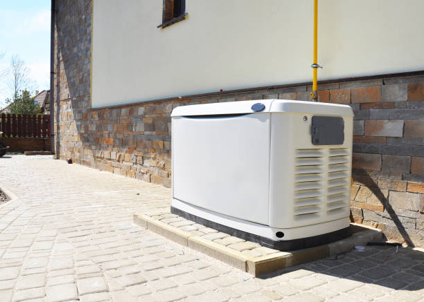 A standby generator sits on the side of a home.